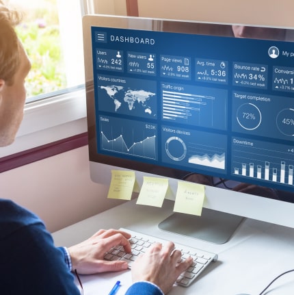 A man checking for code consistency as a custom software development best practice