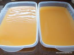 pictures of two large containers of Vino Slush Bourbon Slush drinks